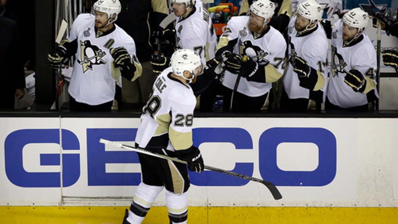 The Latest: Penguins lead Sharks 1-0 after first period